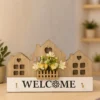 Welcome Haven Wooden Key Holder – Rustic Wall Decor with Floral Details for Entryways - Image 3